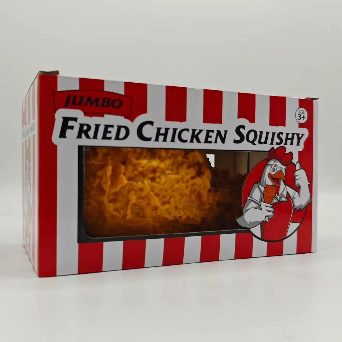 Golden textured jumbo fried chicken drumstick squishy on a light background