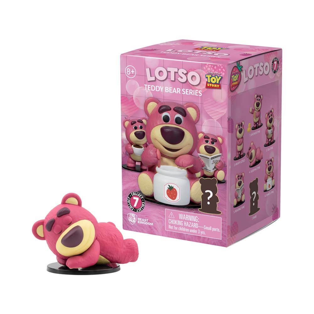 Lotso playing with a yellow star ball figure and packaging