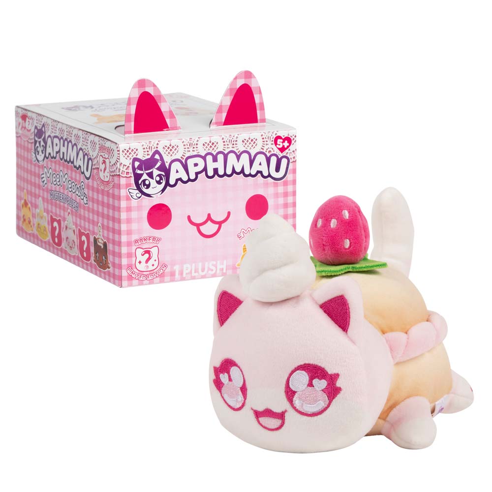Aphmau Cream Puff Cat 6-inch pink and cream MeeMeows plush beside pink Bakery Collection packaging.