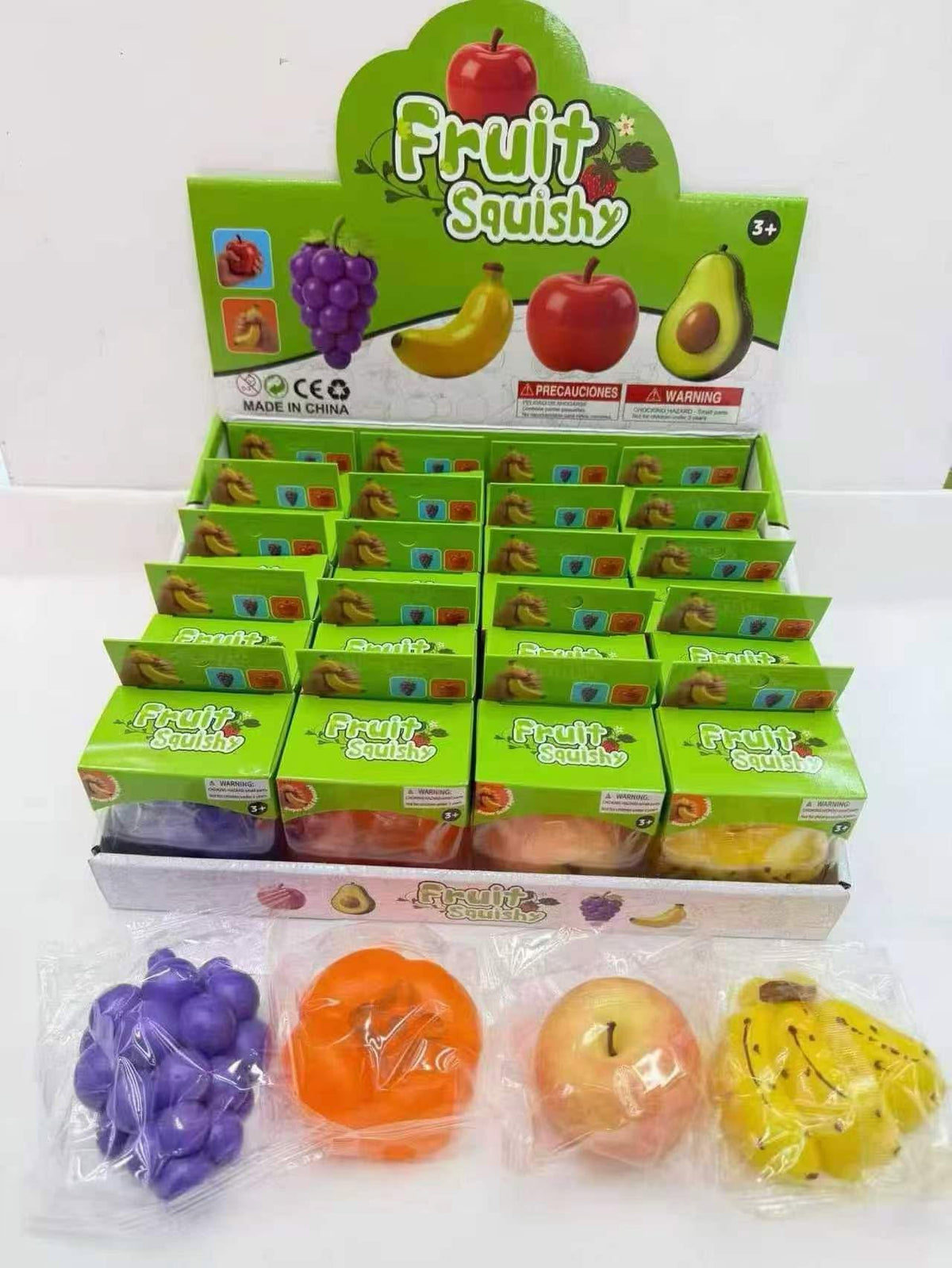 Fruit Squishy display box with Grape, Orange, Apple and Banana squishies in packaging