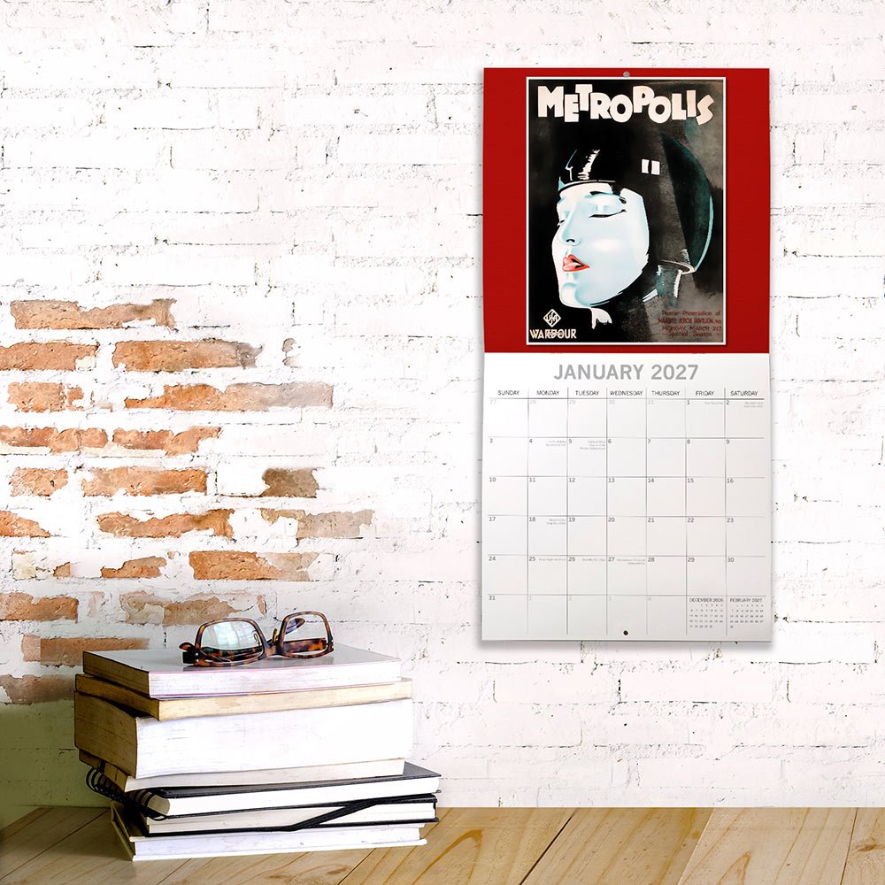 Classic Movie Posters 2027 Square Wall Calendar – January 2027 lifestyle shot featuring Metropolis vintage poster displayed on a brick wall in a home study