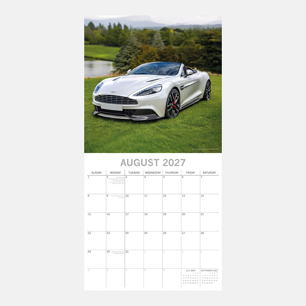 Super Cars 2027 Square Wall Calendar - August 2027 month page featuring a white Aston Martin Vanquish Volante on a green estate