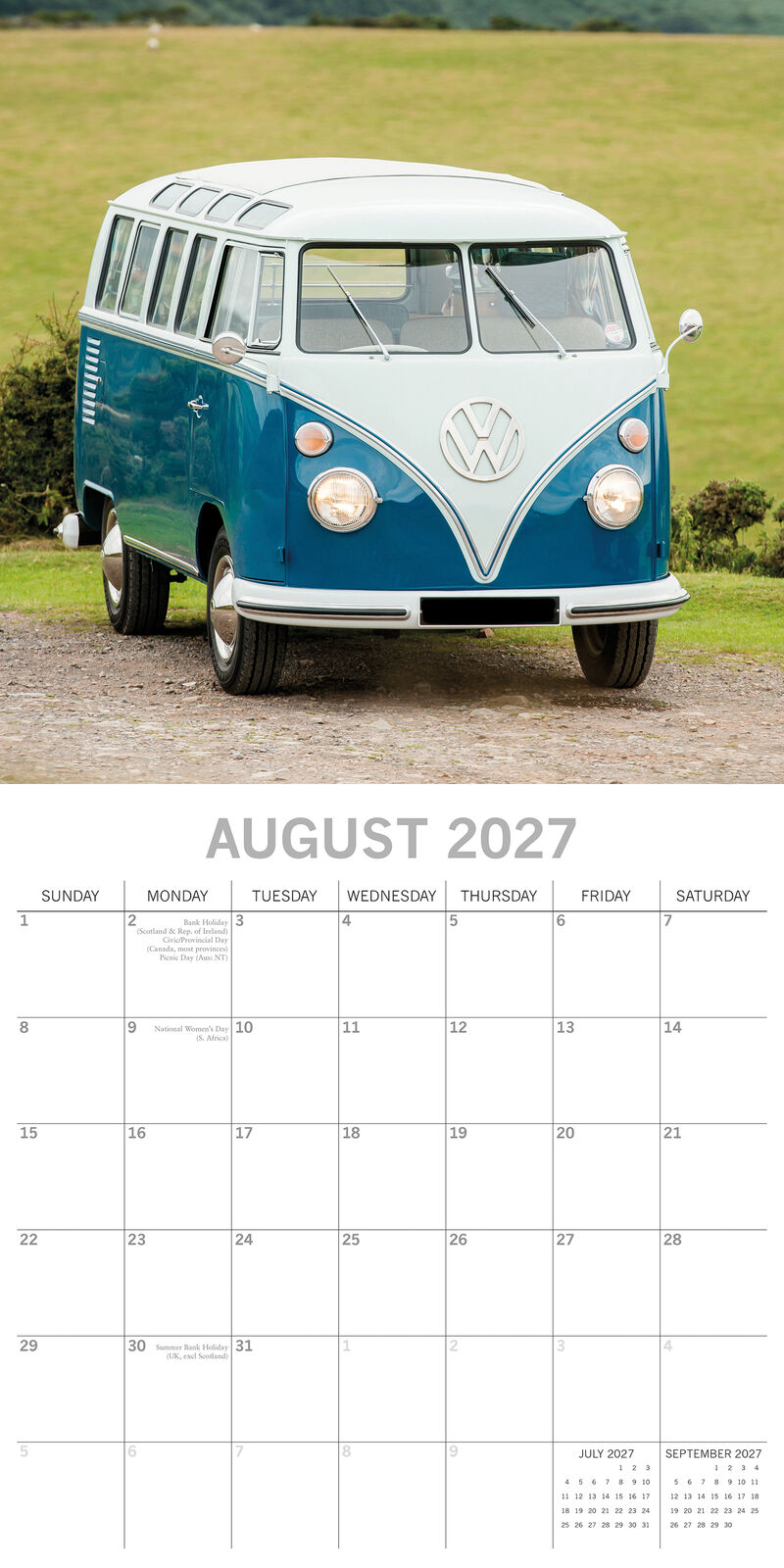 Camper Vans 2027 Calendar – January 2027 lifestyle shot on white wall above desk featuring flower-power painted white VW Bay Window campervan with purple and pink daisy motifs in woodland clearing