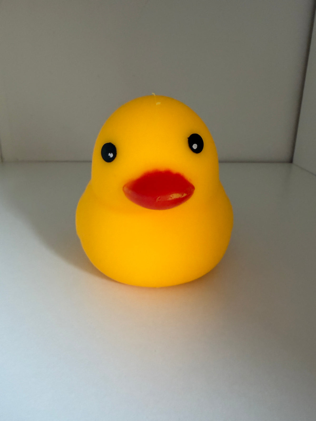 Front view of yellow sitting duck squishy