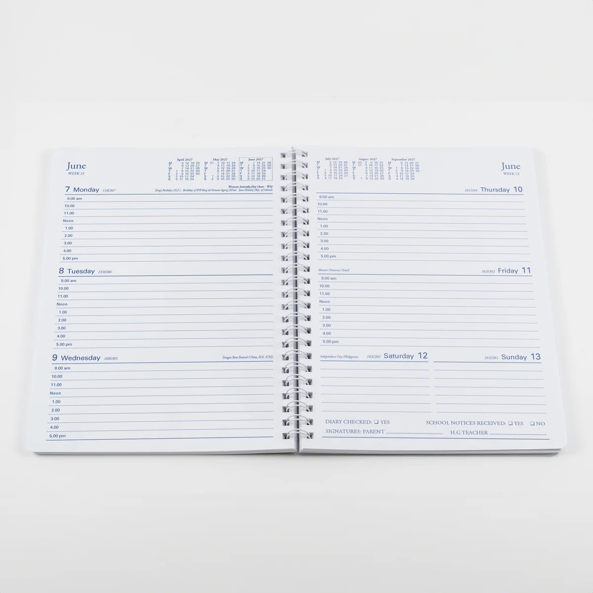 Open Collins Colplan 2027 spiral student diary showing the A5 week-to-view school planning layout