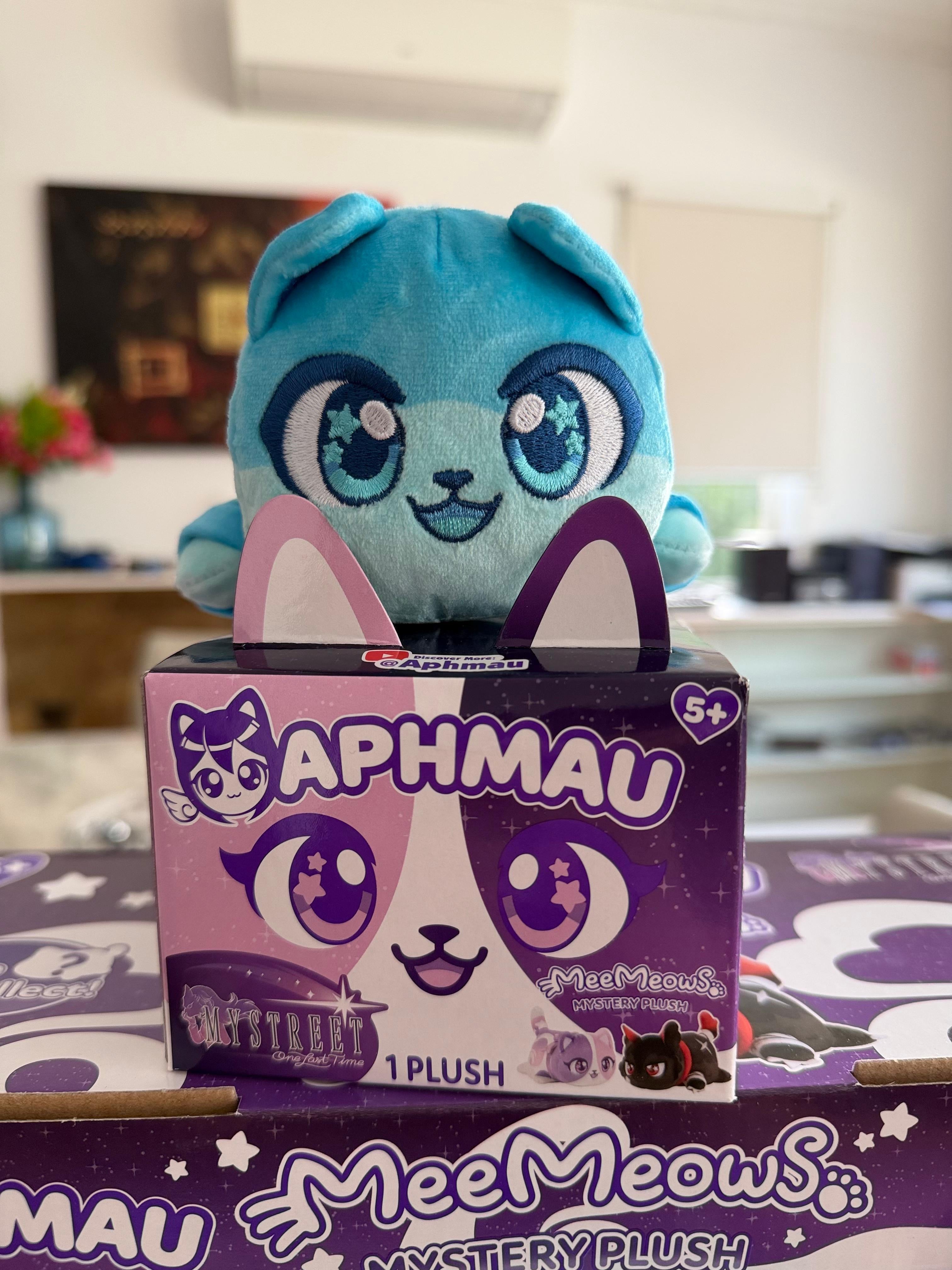 Aphmau MeeMeow Garroth My Street Collection Plush sitting on top of gift box