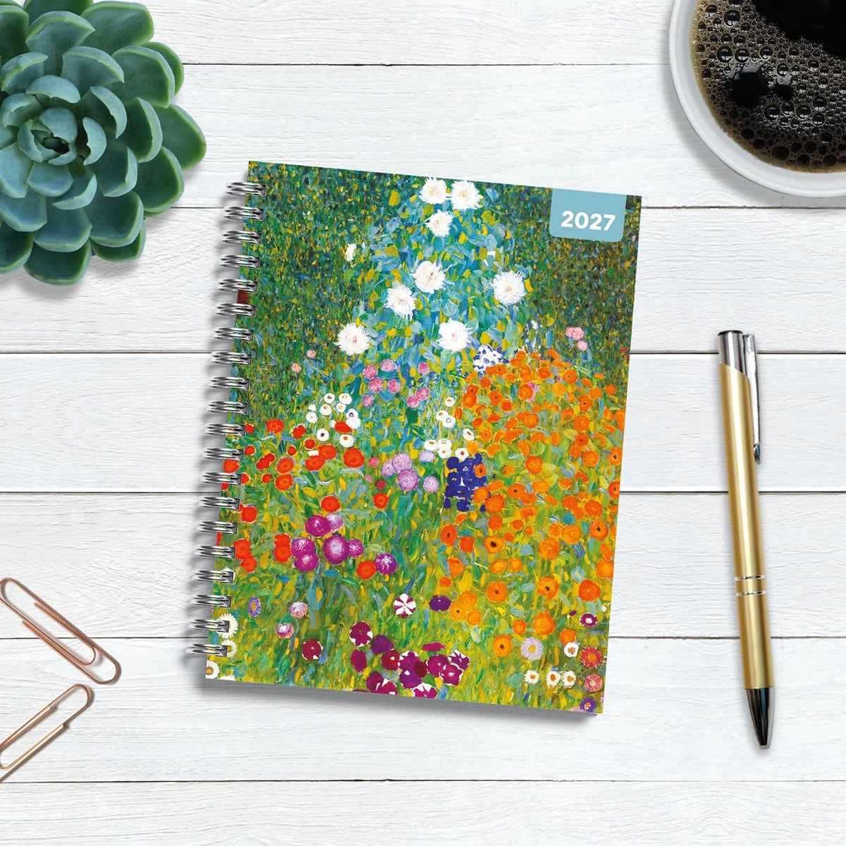 Klimt 2027 A5 Spiral Diary front cover flat lay with colourful floral garden artwork