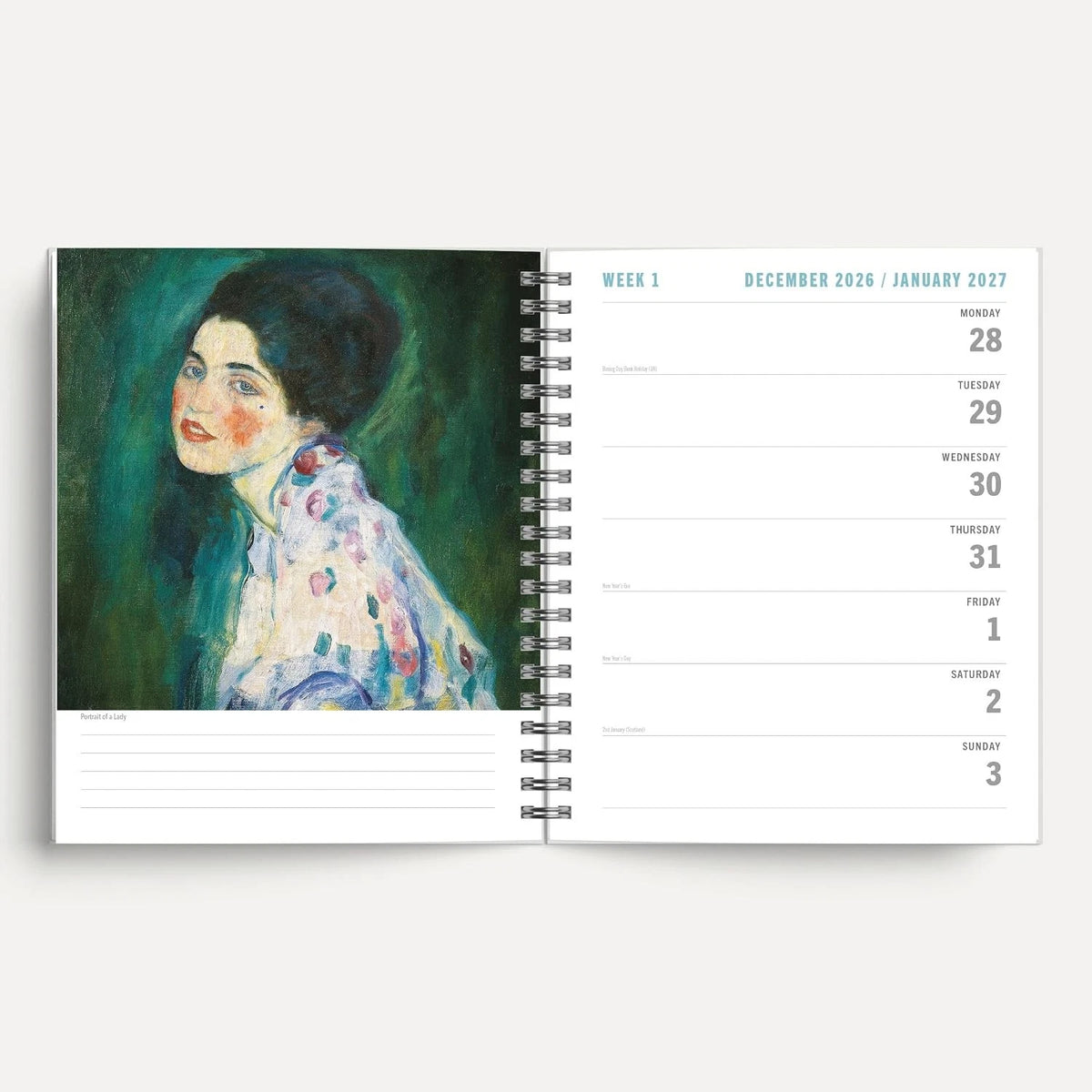 Klimt 2027 A5 Spiral Diary front cover on desk with succulent plant and pen