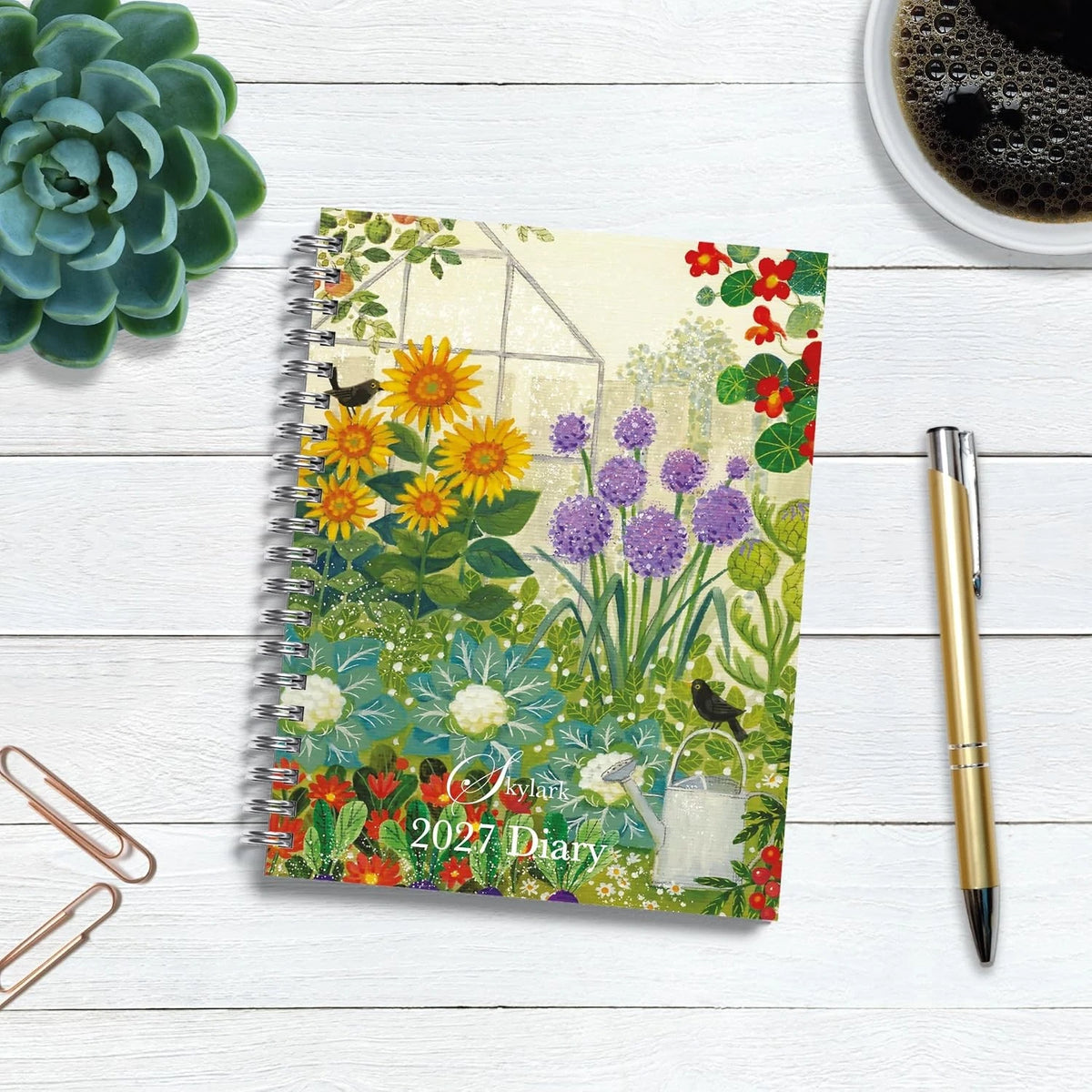 Skylark Summer Bloom 2027 A5 Spiral Diary front cover flat lay with sunflower and allium garden artwork
